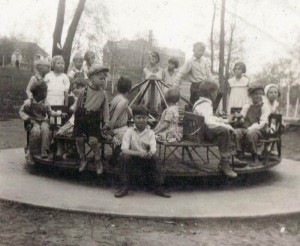 Children on old fashioned Merry-Go_Round