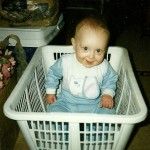 Christopher in clothes basket