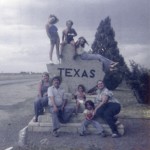 Chantel posing on top of the Texas state line with the family